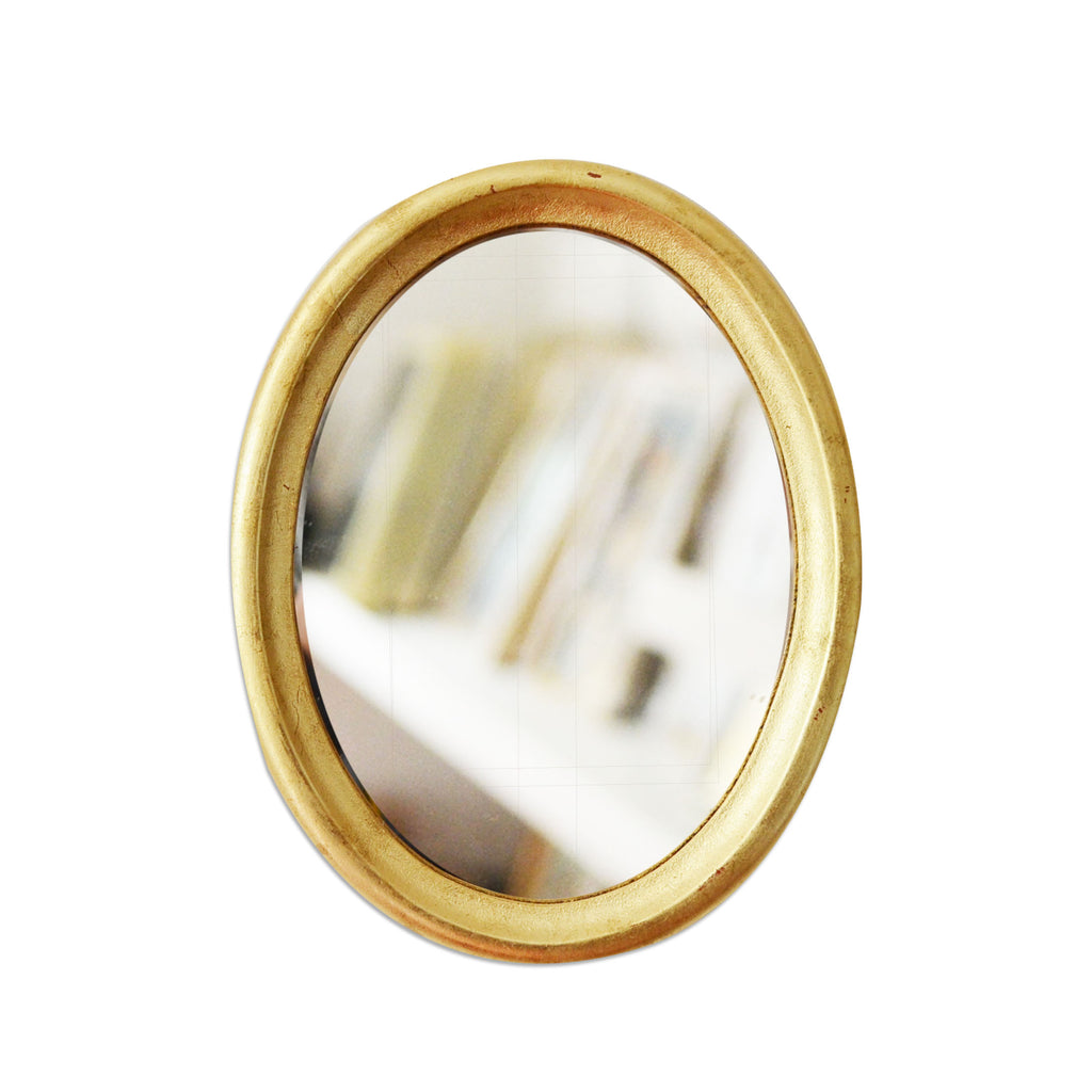 Espejo ovalado dorado grande