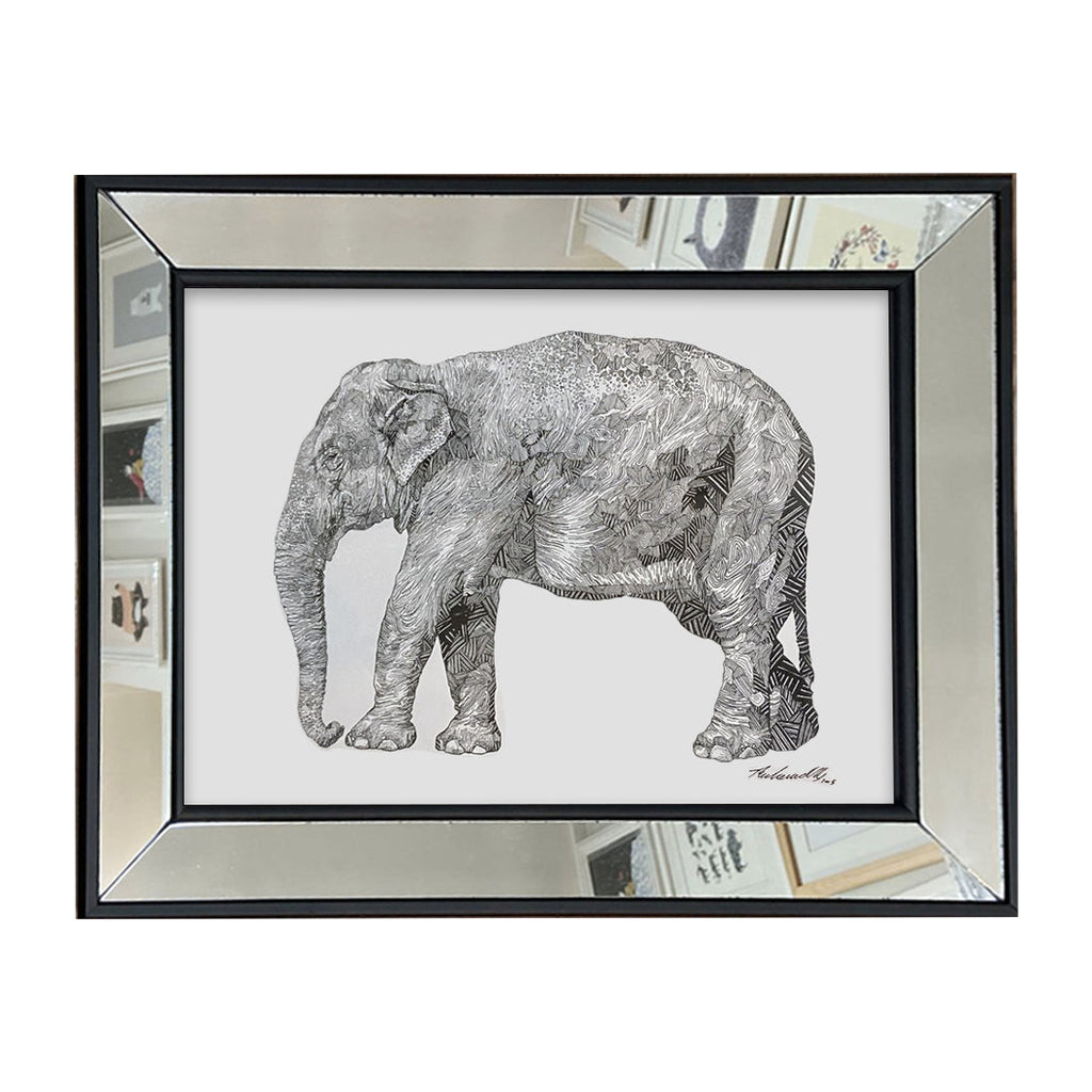 elefante en marco espejo